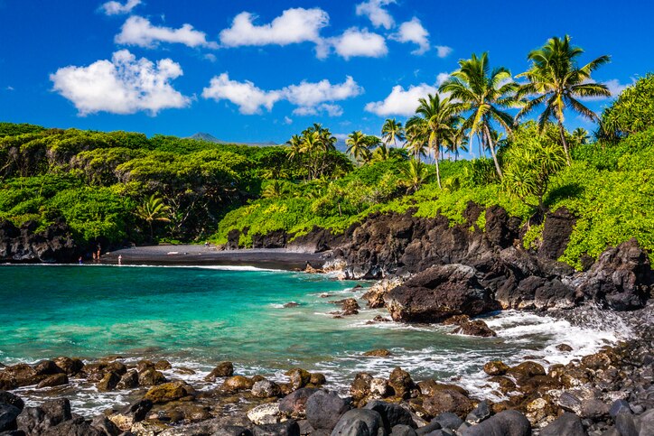 Aerial shot of a blank sand beach on The Big Island of Hawaii.