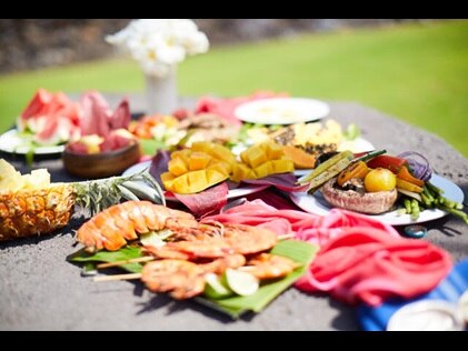 Spread of regional Hawaiian foods in the grill area at Hilton Waikoloa Village on the Big Island of Hawaii.