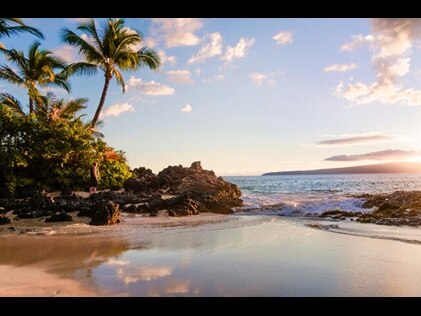 Picturesque shoreline at sunset Maui, Hawaii.