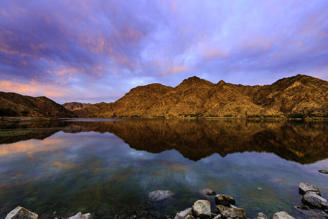 Beautiful image of Lake Mohave with purple painted skies overhead, Nevada. 