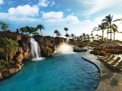 Picturesque pool with waterfalls at Kings' Land, a Hilton Grand Vacations Club, Big Island, Hawaii.