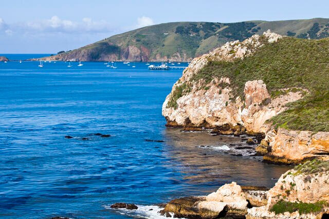 Stunning image of Avila Beach cliffs and bright blue Pacific ocean waters, California.